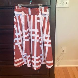 Size 2 Ann Taylor full skirt with fun reddish-white pattern. Great condition.